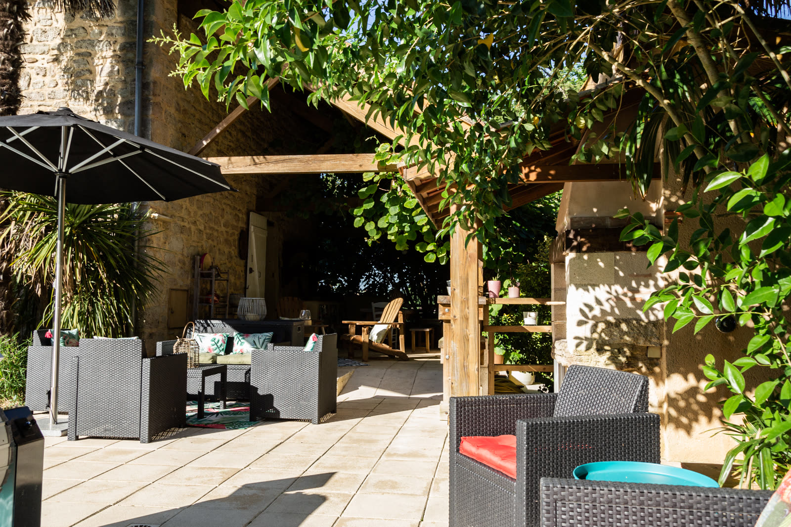 The summer lounge under the wooden pergola